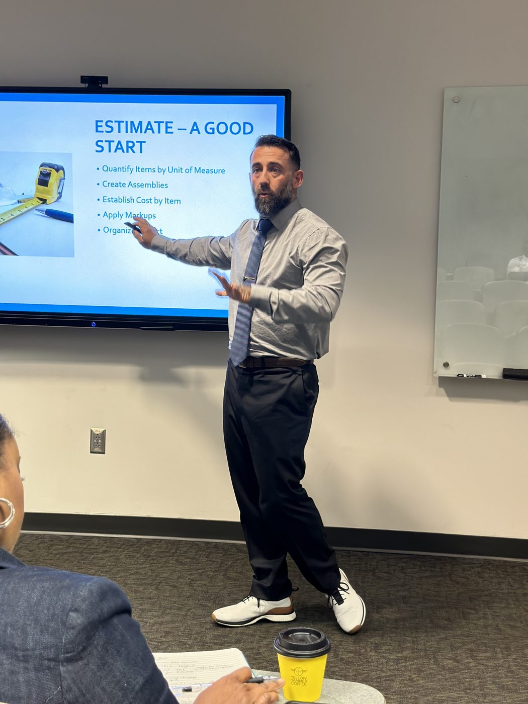 Mark DeGraw teaching a class on construction estimating